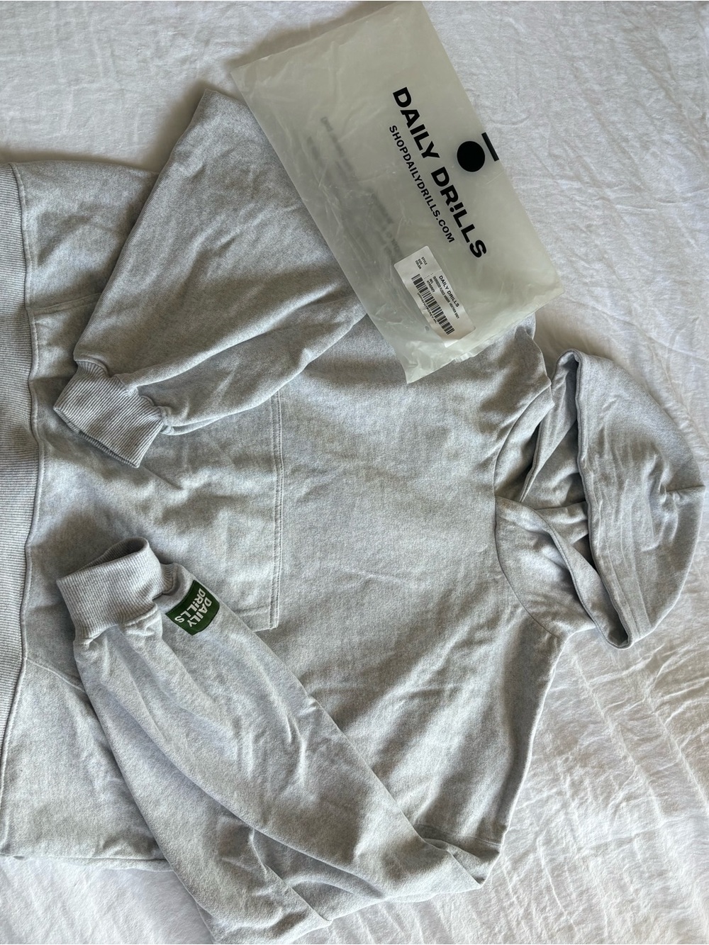 Daily Drills Heather Gray Hoodie with Green Sleeve Patch